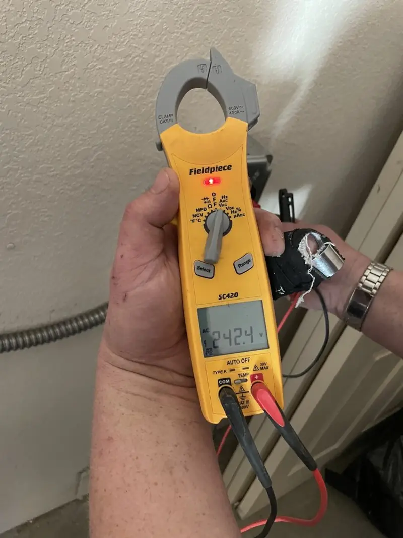 Voltage testing with clamp meter during Aluminum Wiring Replacement in Monessen